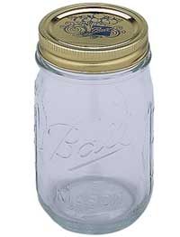 Quart-sized glass mason jar with a wide mouth
